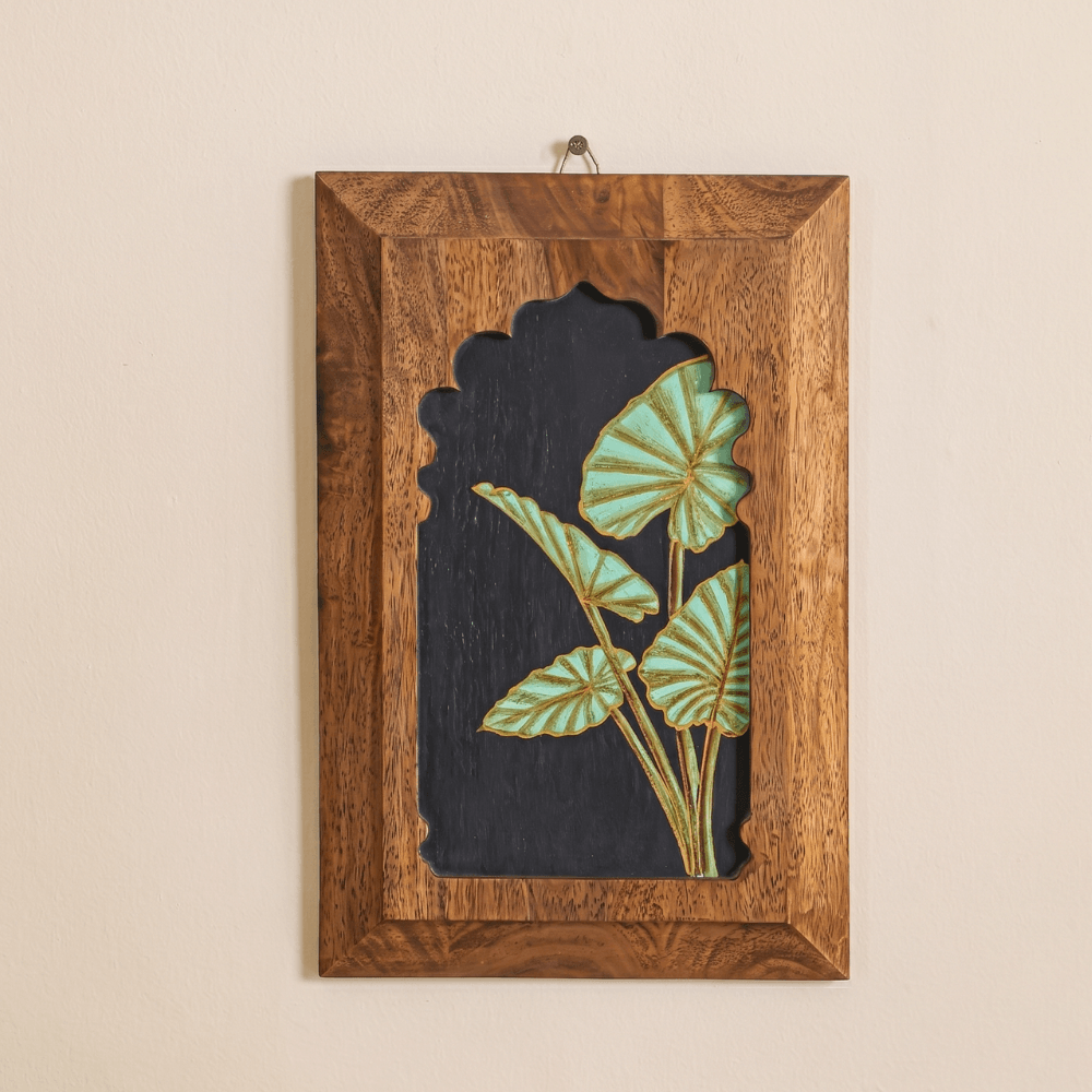 Hand-painted Taro Leaf wooden wall art from Mirai Woods Inu Jharokha wall decor showcasing intricate leaf design and natural wood finish.